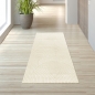Preview: Moderner Wohnzimmerteppich mit elegantem Bogenmuster in Creme