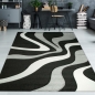 Preview: Designer Teppich mit Konturenschnitt Wellenmuster Schwarz Grau Weiss
