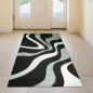 Preview: Designer Teppich mit Konturenschnitt Wellenmuster Schwarz Grau Weiss