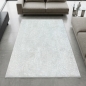 Preview: Robuster Teppich Creme mit modernem Linienmuster und Fransen