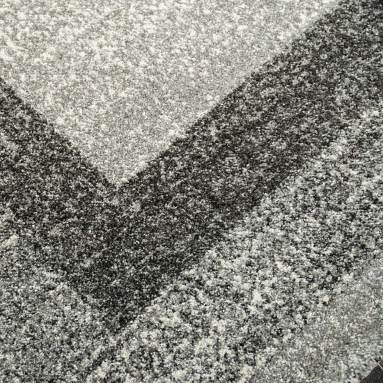 Preview: Designer Wohnzimmer Teppich Modern kurzflor vintage seitlich gekettelt in grau creme