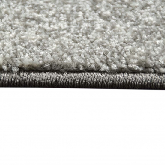 Preview: Designer Wohnzimmer Teppich Modern kurzflor vintage seitlich gekettelt in grau creme
