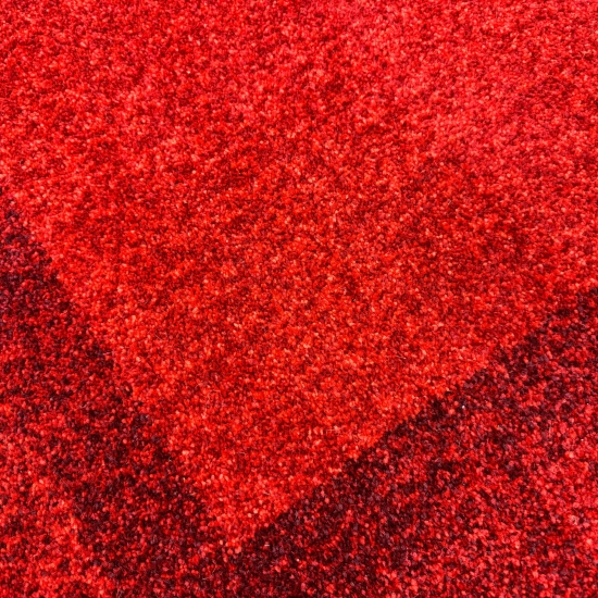 Preview: Wohnzimmer Teppich Designer kurzflor Modern vintage seitlich gekettelt in rot