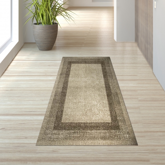 Wohnzimmerteppich Designer vintage kurzflor Modern seitlich gekettelt in beige braun