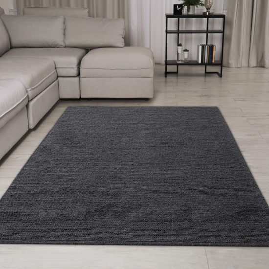 Elegant handgewobener Wollteppich in anthrazit