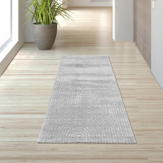 Moderner Teppich mit stilvollem Bogenmuster in Grau