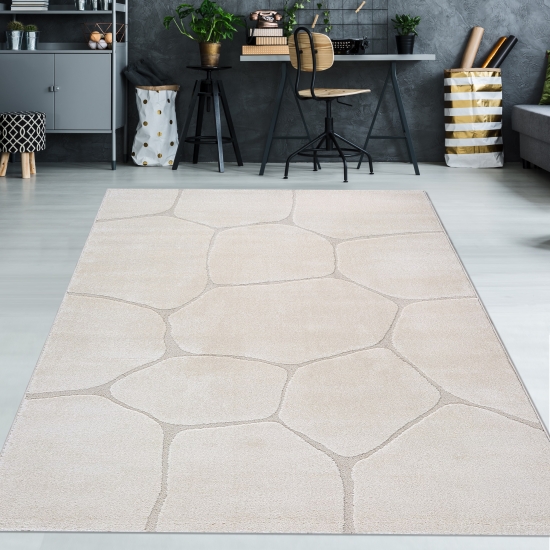 Wohnzimmerteppich mit 3D-Effekt und abstraktem Muster in Creme