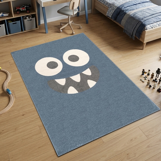 Runder Spielteppich Blau mit Monster Gesicht