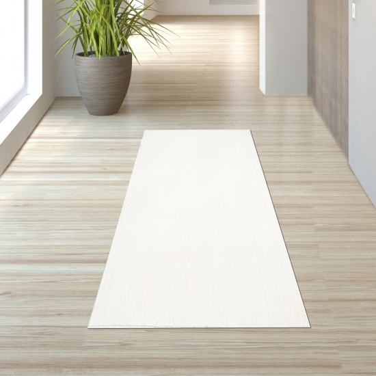 Preview: Teppich in Creme mit flauschiger Oberfläche und Antirutsch-Rücken