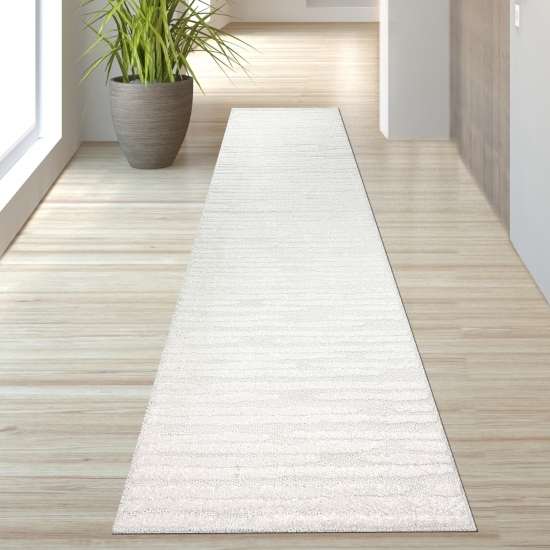 Preview: Schlafzimmer Wohnzimmer Teppich mit verschieden gemusterten Linien in der Farbe creme grau