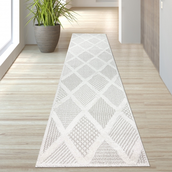 Preview: Schlafzimmer Wohnzimmer Teppich mit verschieden gemusterten Rauten in creme grau