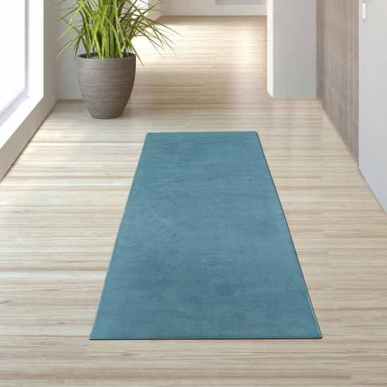 Preview: Türkiser Teppich weich dekorativ pflegeleicht ideal für modernes Zuhause