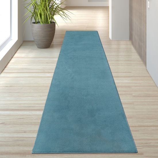 Preview: Türkiser Teppich weich dekorativ pflegeleicht ideal für modernes Zuhause