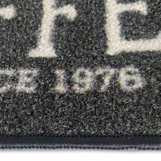 Teppich mit Schriftzug Coffee