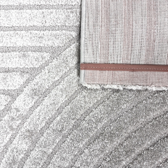 Moderner Teppich mit stilvollem Bogenmuster in Grau