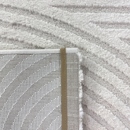 Eleganter Wohnzimmerteppich mit geometrischem Kreismuster in Creme