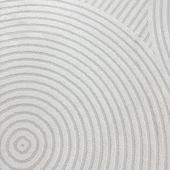 Eleganter Wohnzimmerteppich mit geometrischem Kreismuster in Creme