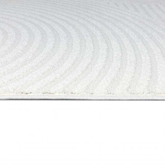 Eleganter Wohnzimmerteppich mit geometrischem Kreismuster in Creme