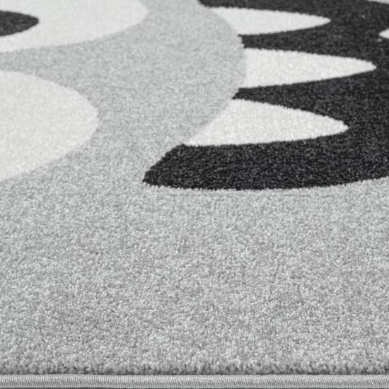 Runder Spielteppich Grau mit Monster Gesicht