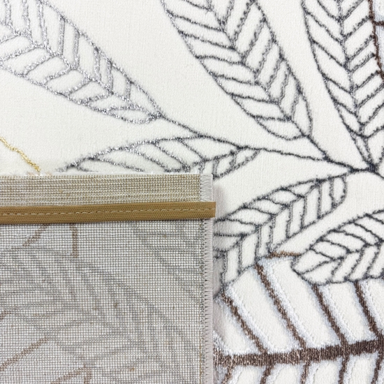 Moderner Wohnteppich mit exotischem Blattdesign in Creme Gold