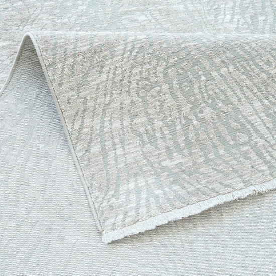 Robuster Teppich Creme mit modernem Linienmuster und Fransen