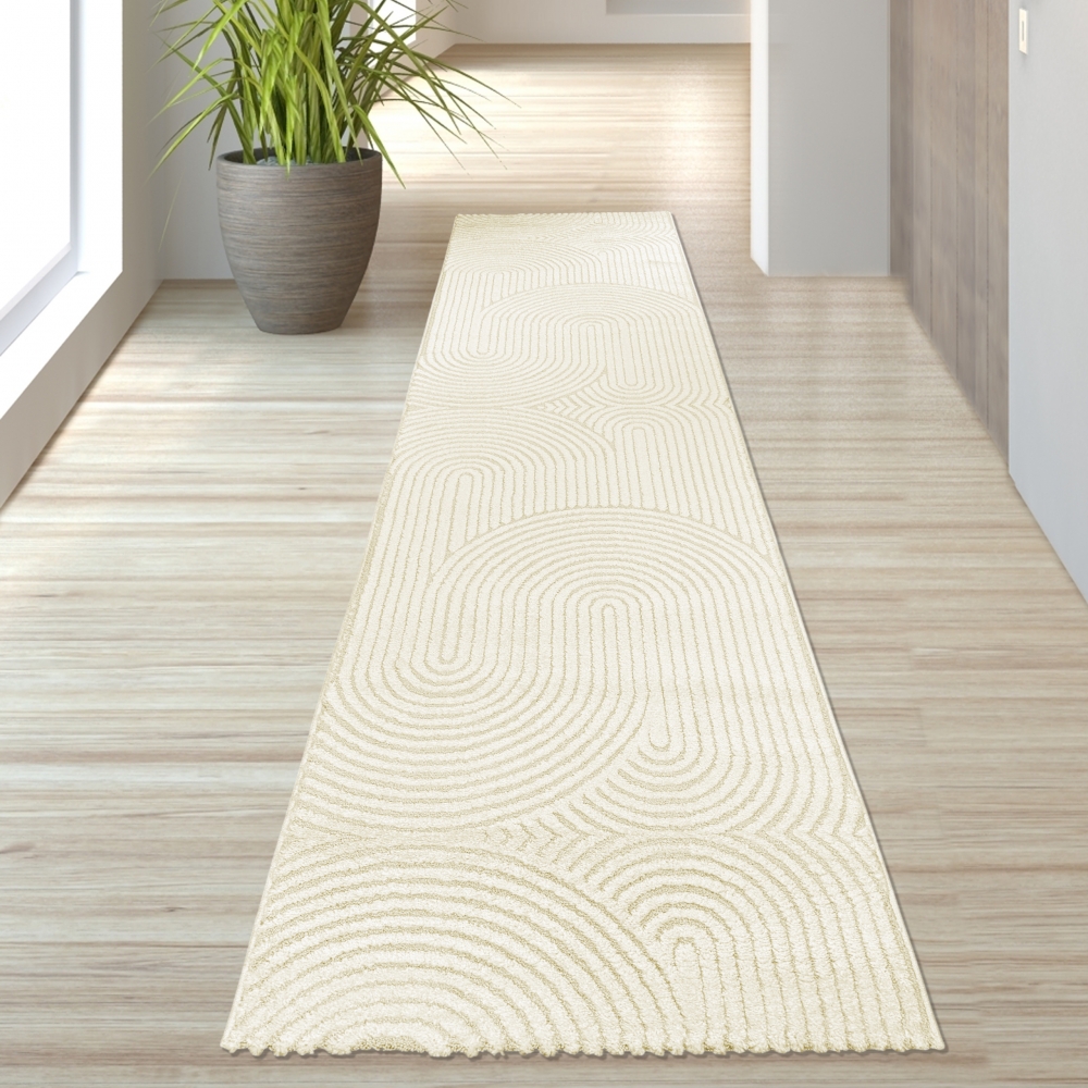 Moderner Wohnzimmerteppich mit elegantem Bogenmuster in Creme