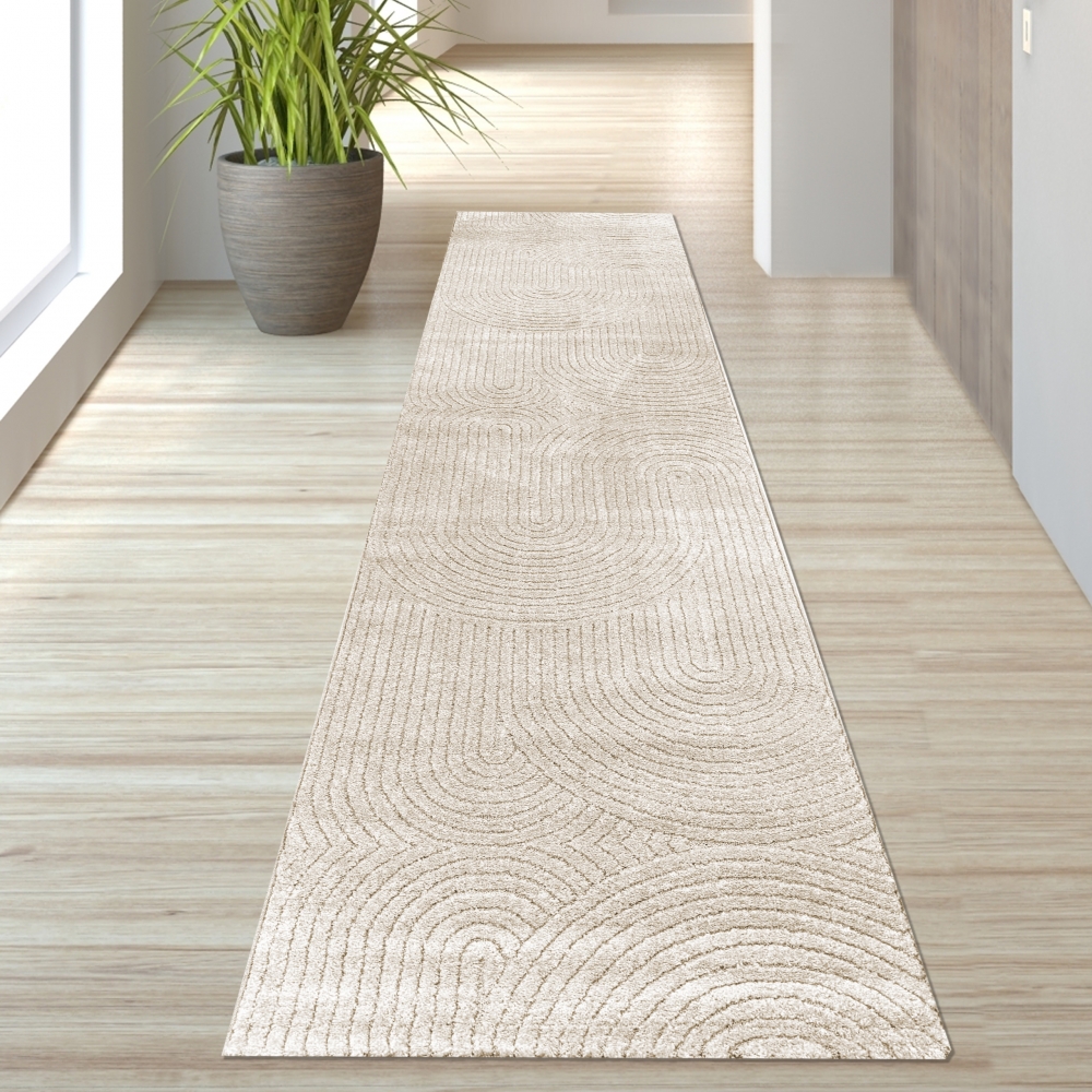 Moderner Teppich mit geometrischem Bogenmuster in stilvollem beige