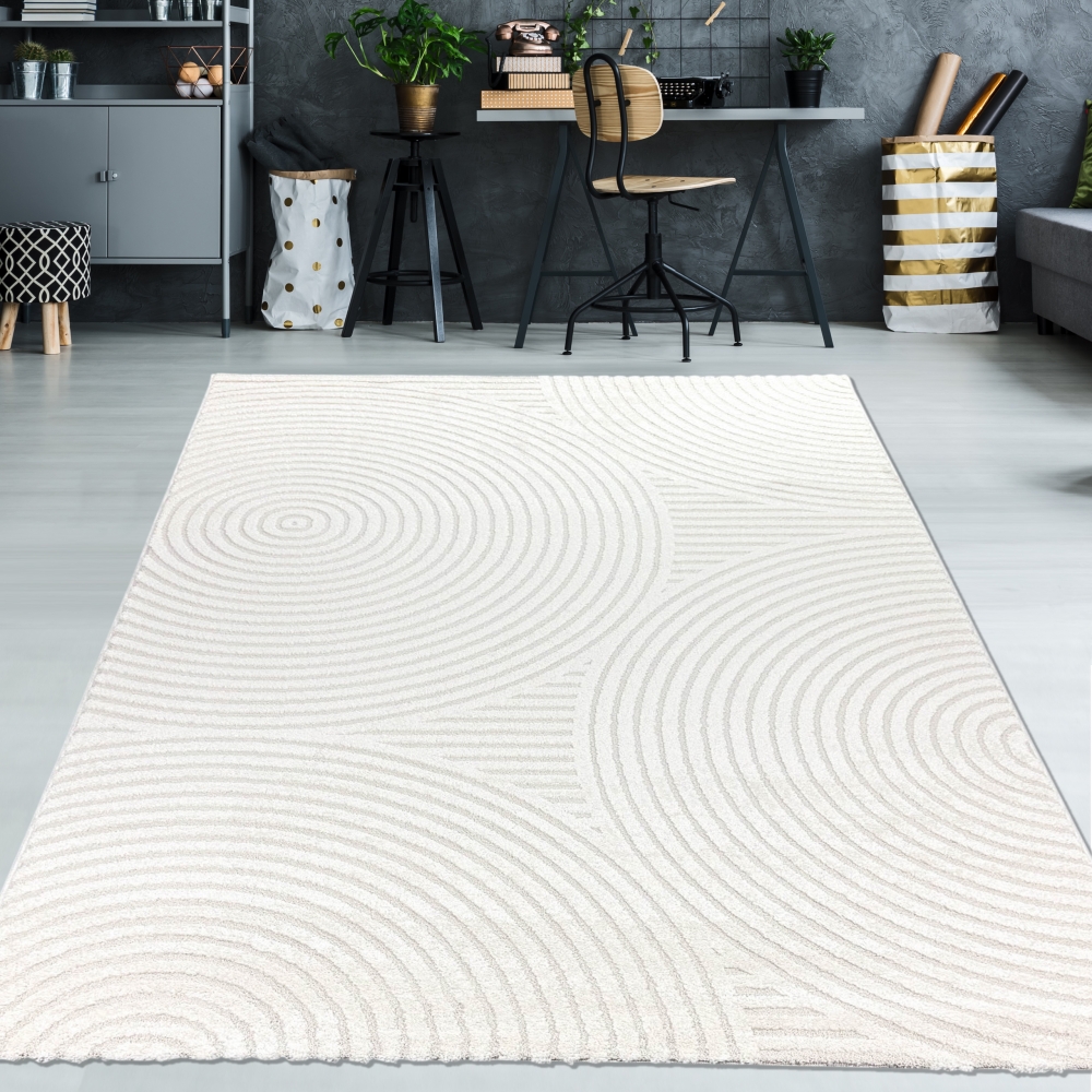Eleganter Wohnzimmerteppich mit geometrischem Kreismuster in Creme
