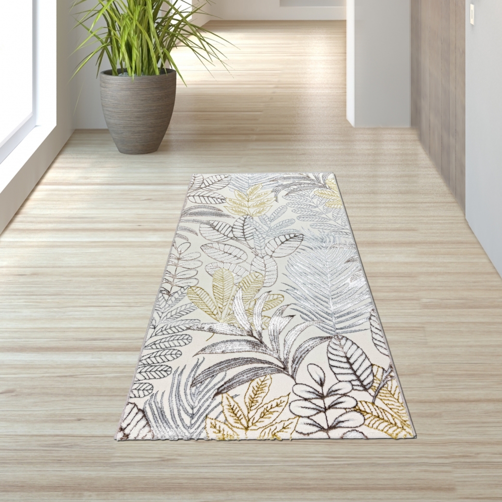 Moderner Wohnteppich mit exotischem Blattdesign in Creme Gold