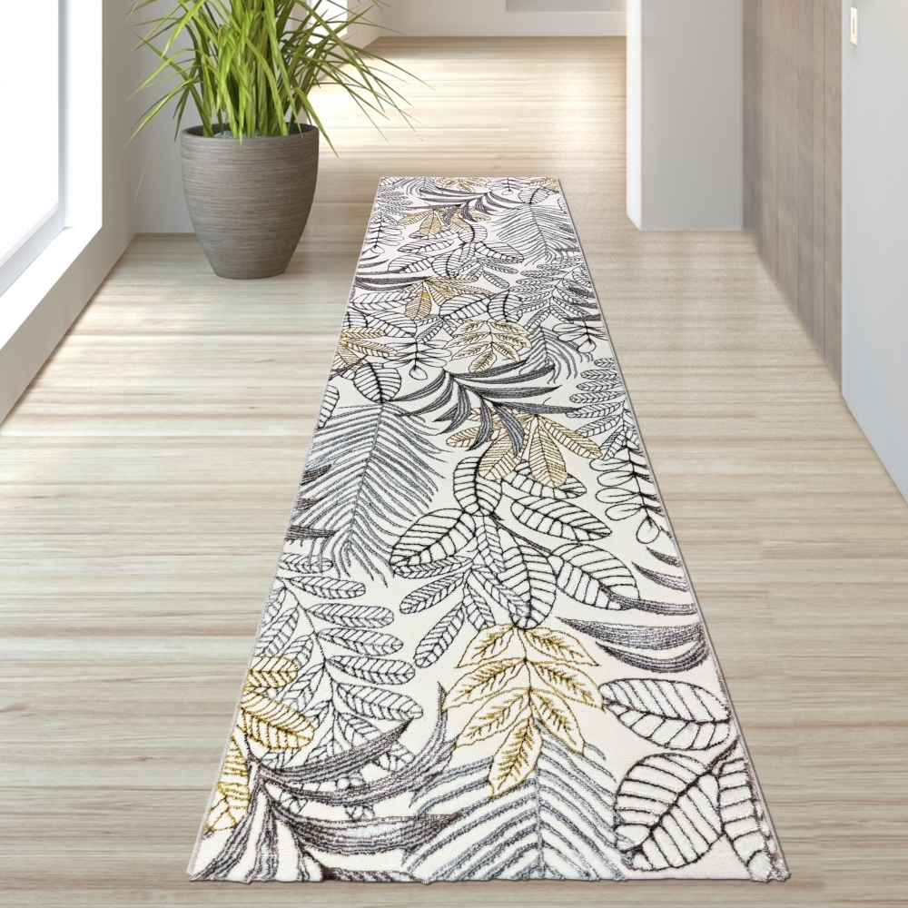 Moderner Wohnteppich mit exotischem Blattdesign in Creme Gold