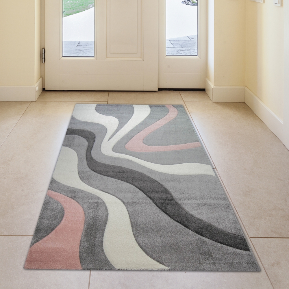 Teppich mit Wellen in grau rosa