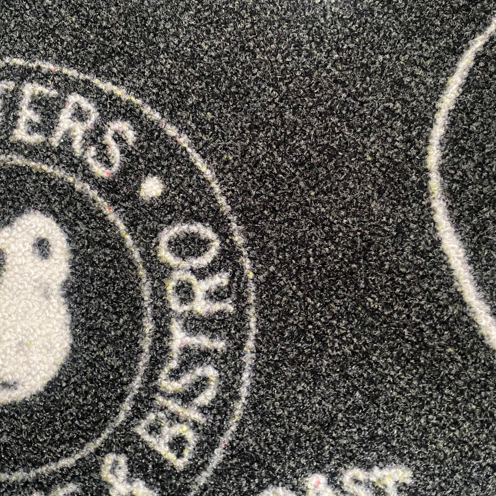 Teppich mit Schriftzug Coffee