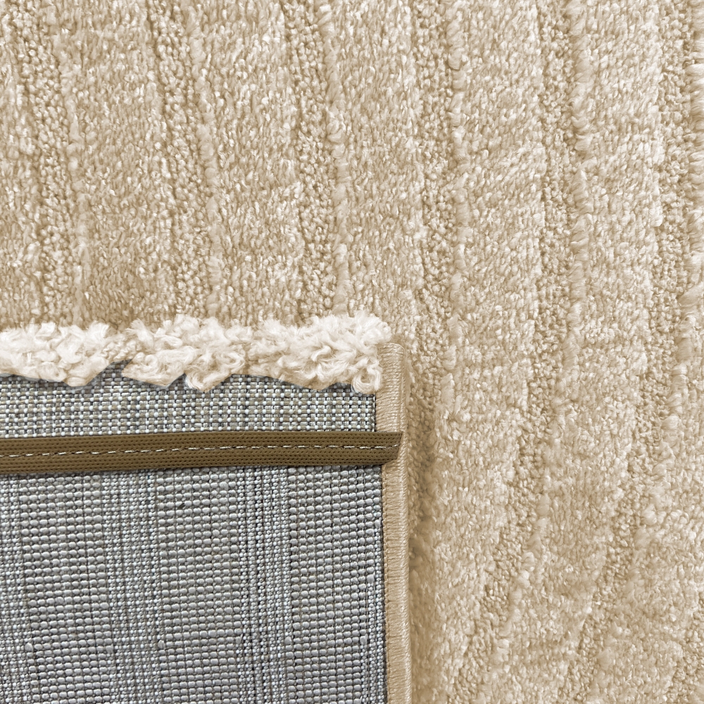 Moderner Teppich mit geometrischem Bogenmuster in stilvollem beige