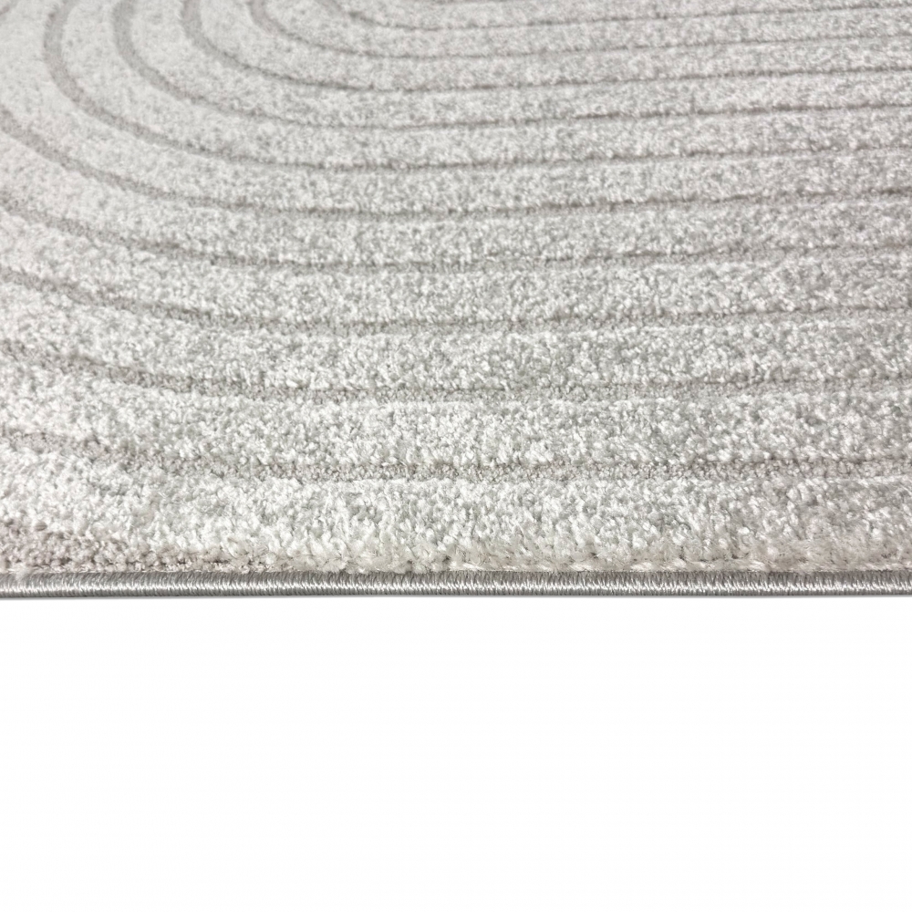 Moderner Teppich mit stilvollem Bogenmuster in Grau