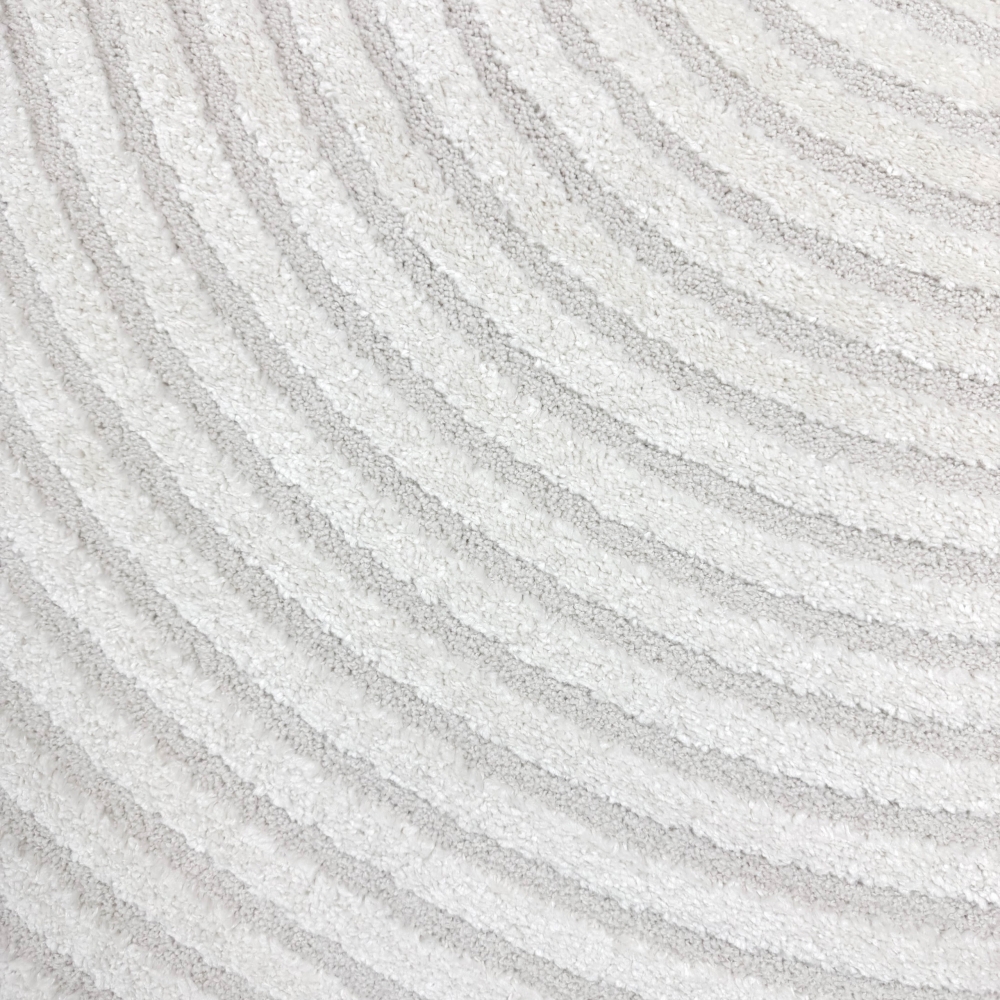 Eleganter Wohnzimmerteppich mit geometrischem Kreismuster in Creme