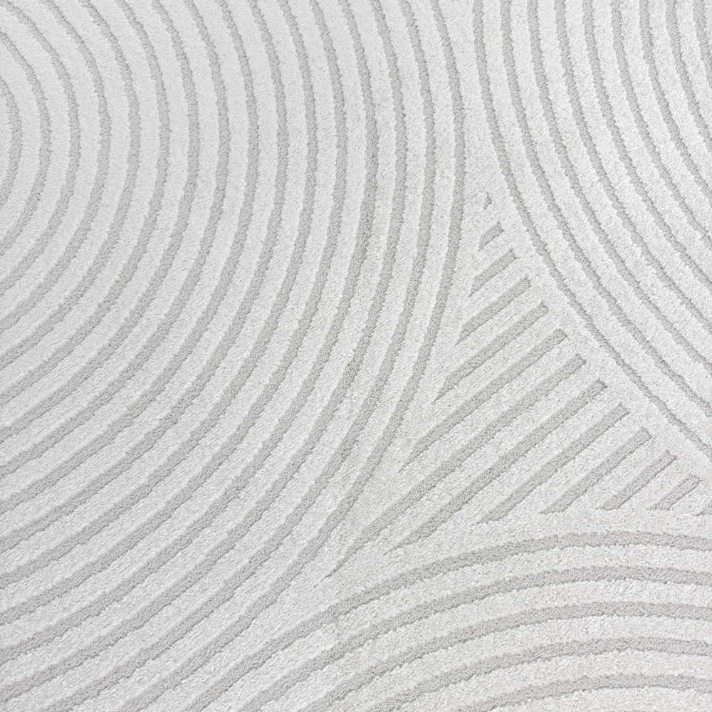 Eleganter Wohnzimmerteppich mit geometrischem Kreismuster in Creme
