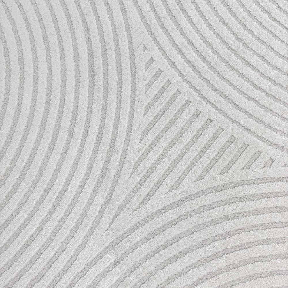 Eleganter Wohnzimmerteppich mit geometrischem Kreismuster in Creme