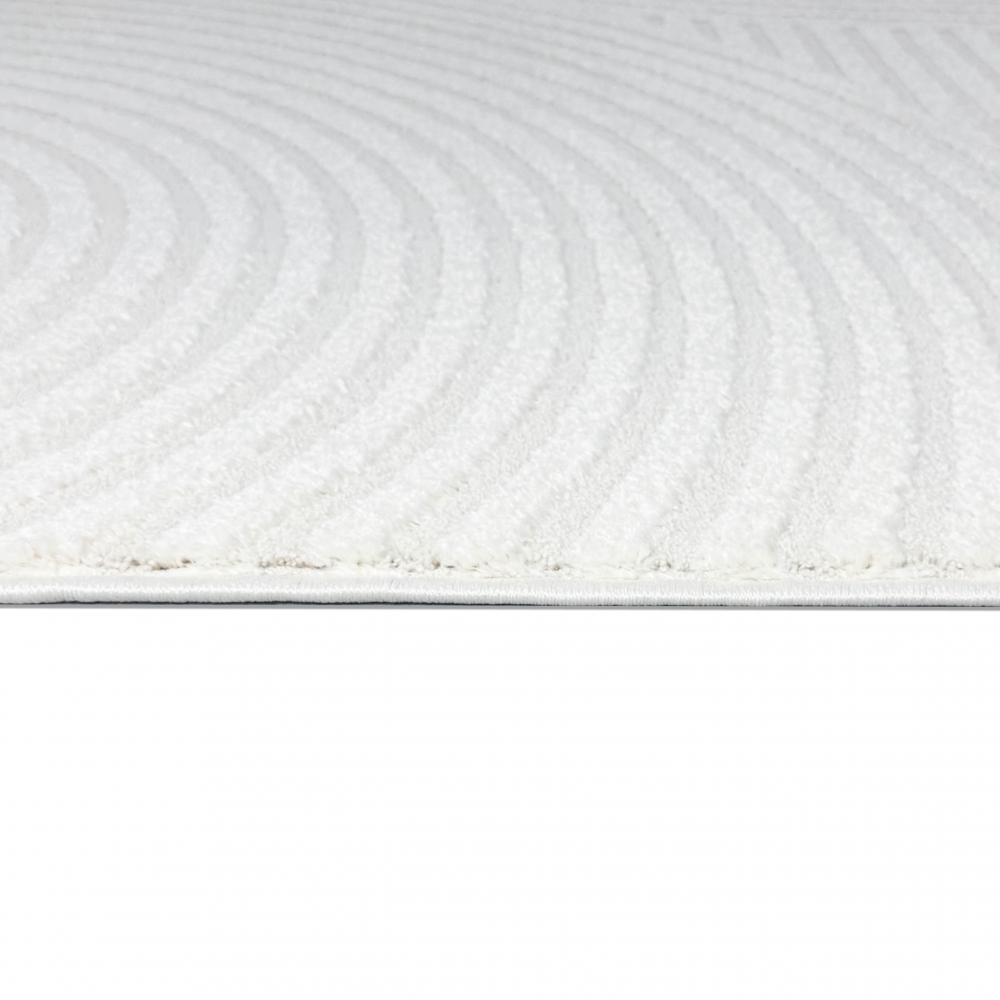 Eleganter Wohnzimmerteppich mit geometrischem Kreismuster in Creme