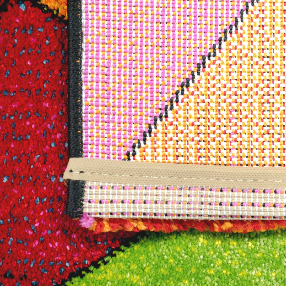Teppich buntes Rautenmuster grün gelb orange