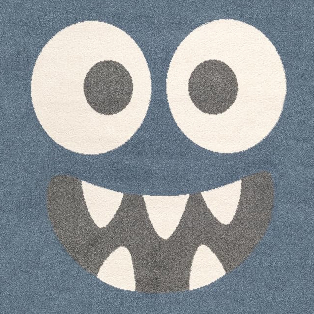 Runder Spielteppich Blau mit Monster Gesicht