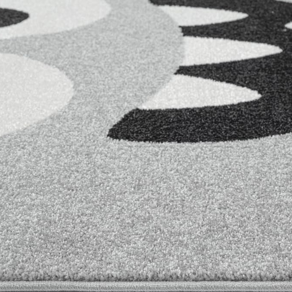Runder Spielteppich Grau mit Monster Gesicht