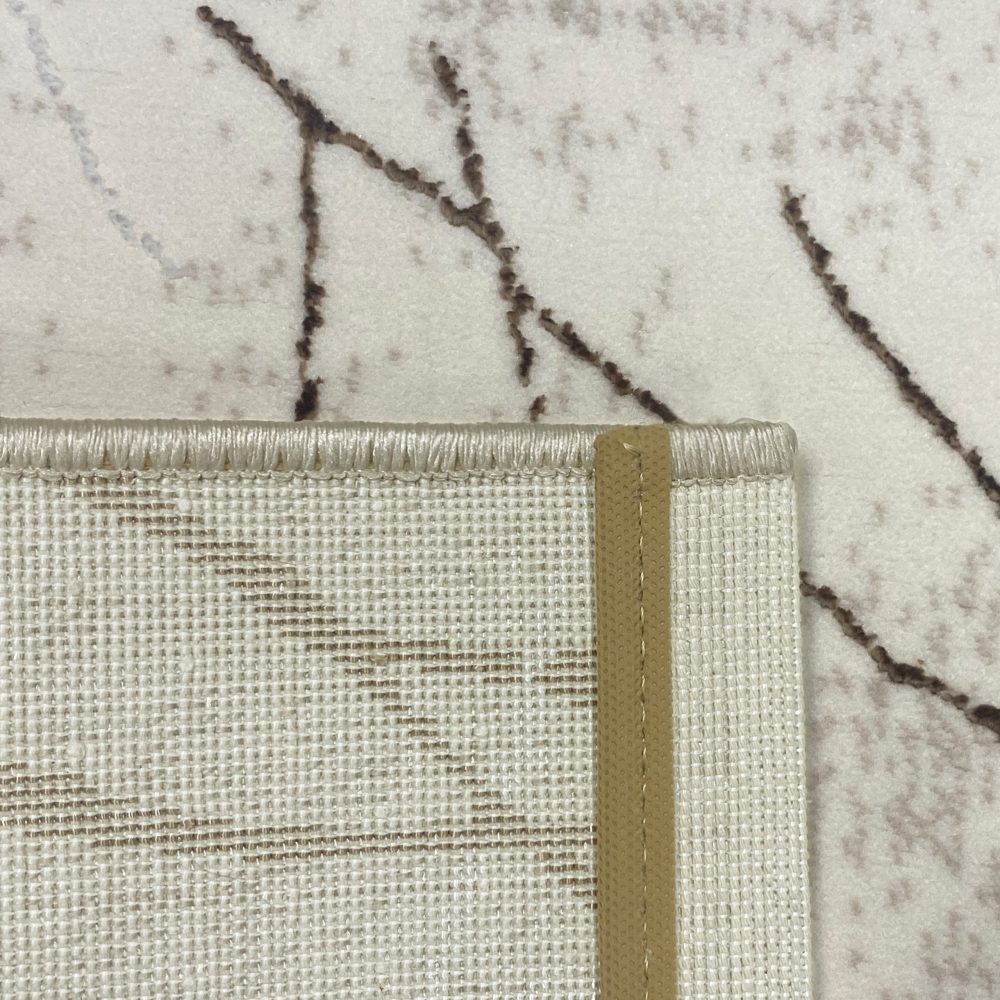 Designer Teppich Ästemuster in creme