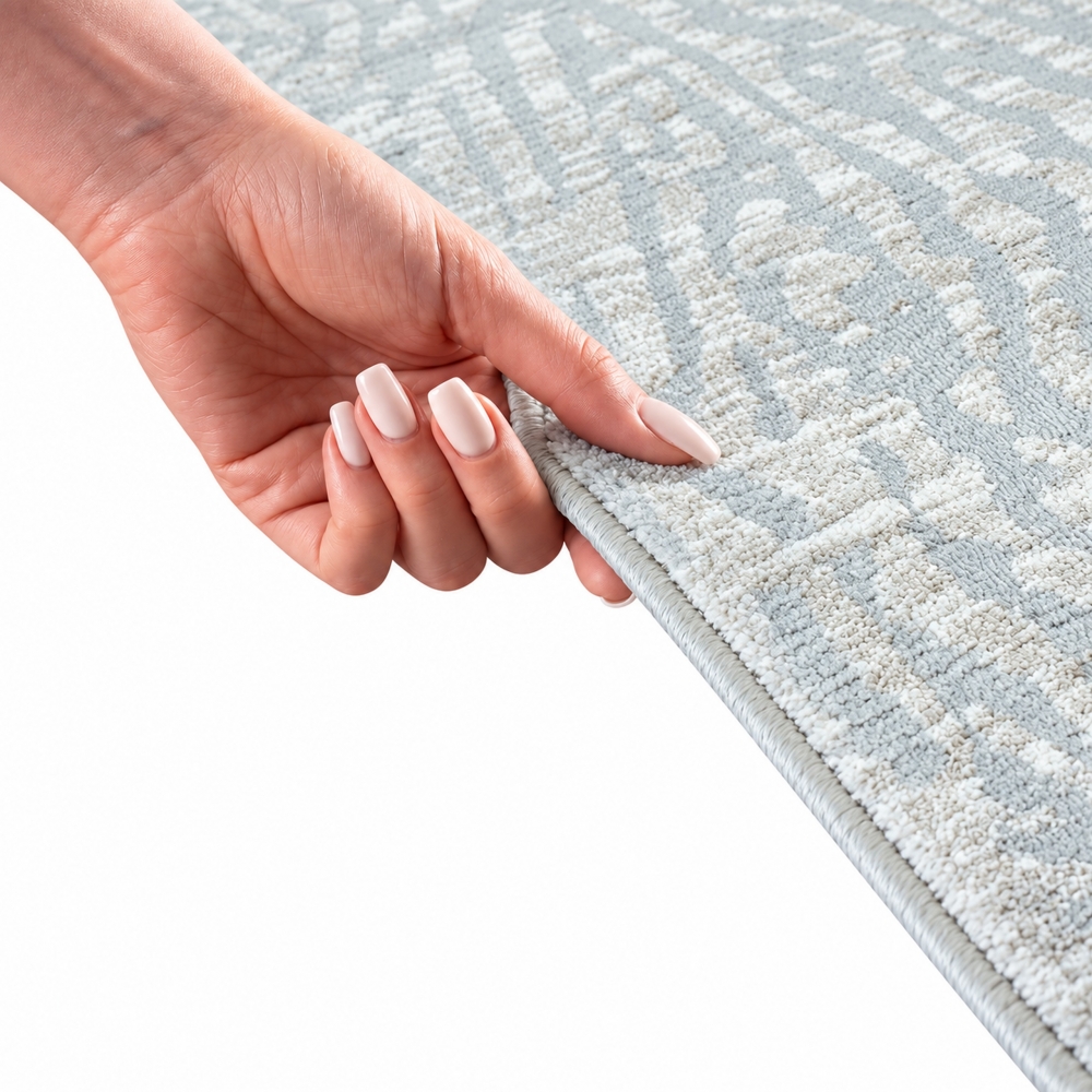 Robuster Teppich Creme mit modernem Linienmuster und Fransen